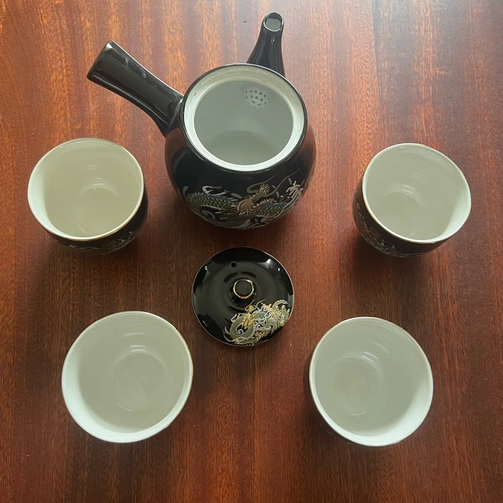 Japanese 7 piece tea set with 5 cups and a tea pot in gold dragon pattern